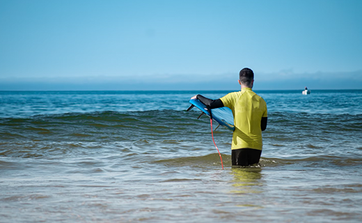 surf lessons 2 Surfer taking surf lessons